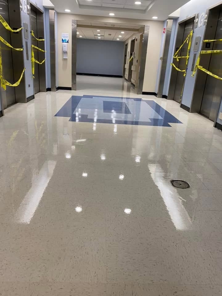 A mirror-finish terrazzo elevator lobby after stripping, waxing and burnishing.